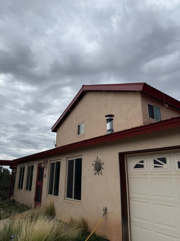 Edgewood home with new Rustic Red metal fascia