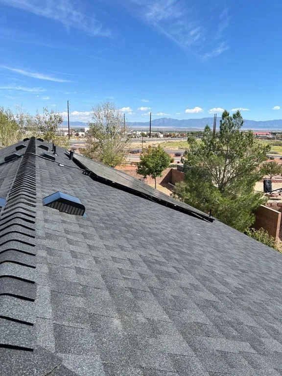 Same roof with new charcoal shingles and ridge cap