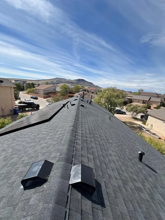 Los Lunas home with a new GAF Timberline NS Charcoal shingle roof