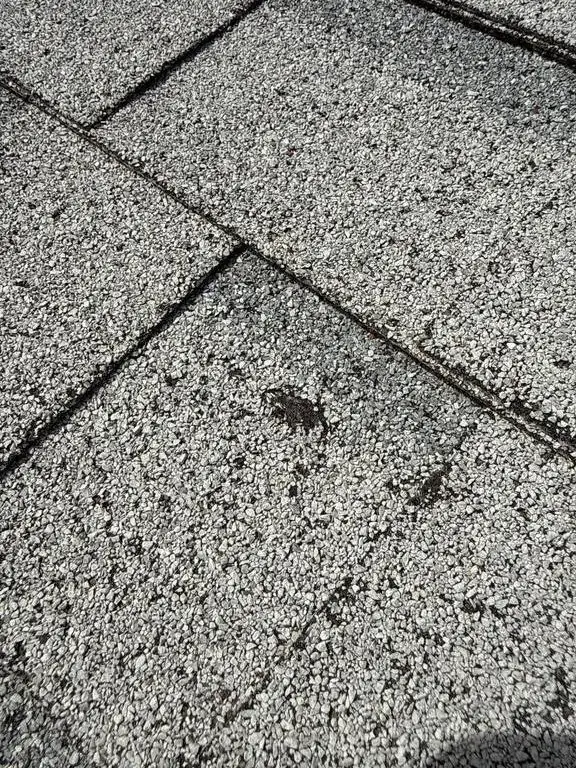 More hail hits on the same slope of the Southeast Albuquerque roof