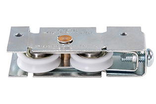 Close-up of the patented dual-tandem nylon roller wheel hardware on a sliding patio door