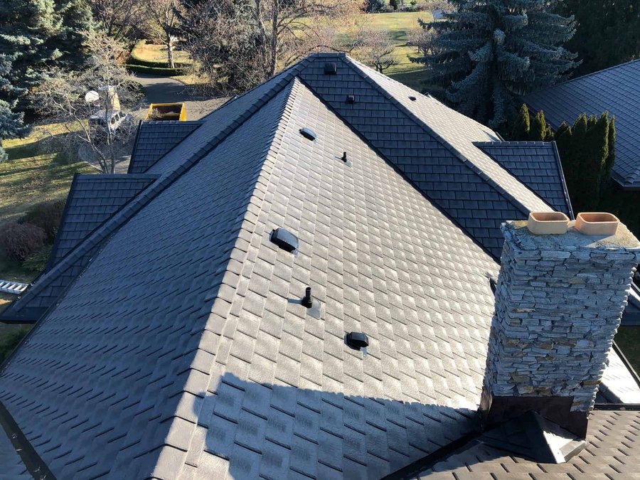 Aerial detail of an Enviroshake roof with vents and chimney