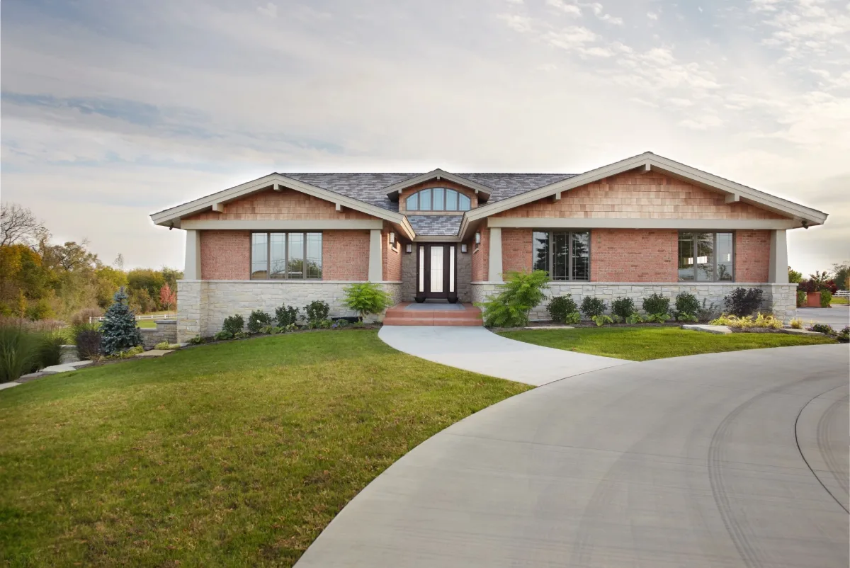 Craftsman ranch home with an Enviroshake Multi-Tone roof