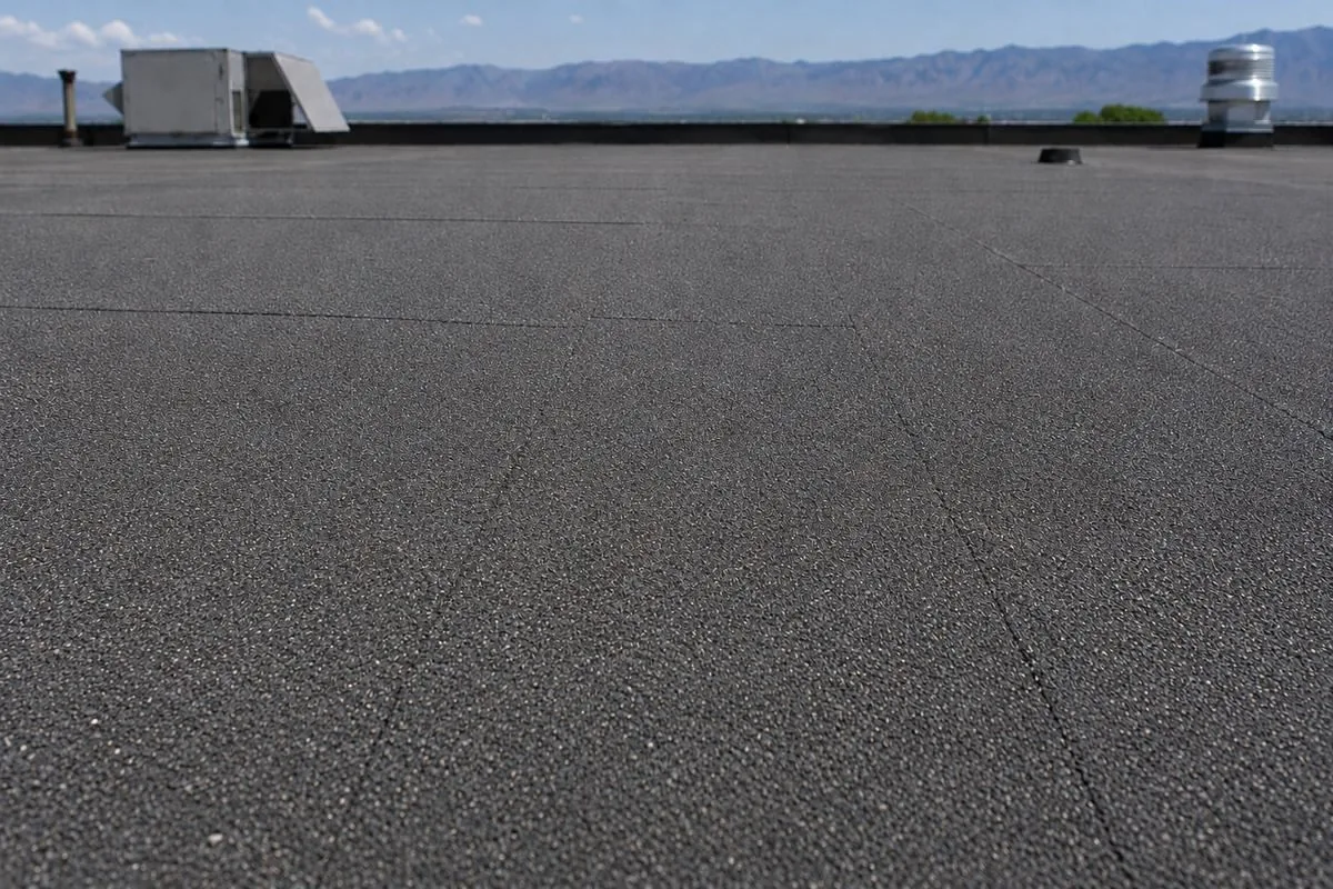 Modified bitumen roof cap sheet in sound condition with no cracking
