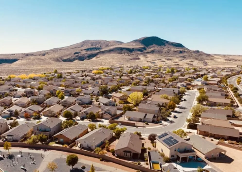 Newer subdivision on the mesa with volcanic mountain backdrop, Rio Rancho, NM