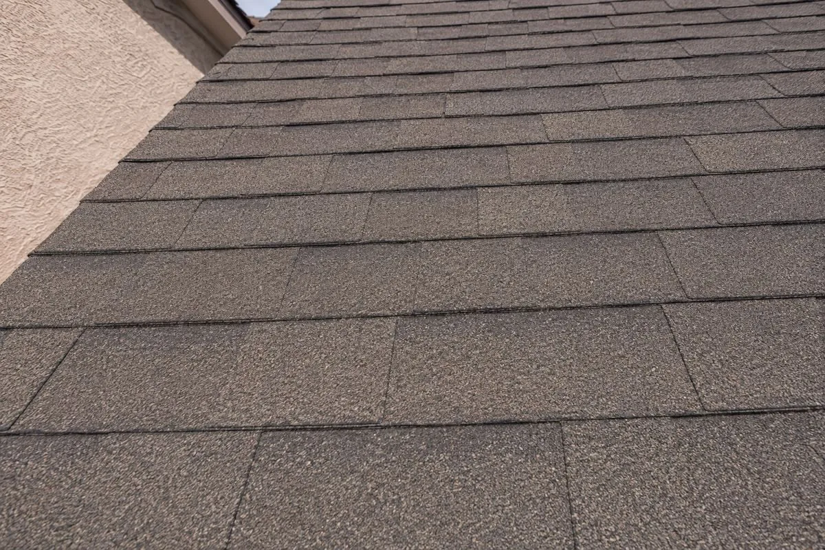 Same roof after replacement with new asphalt shingles