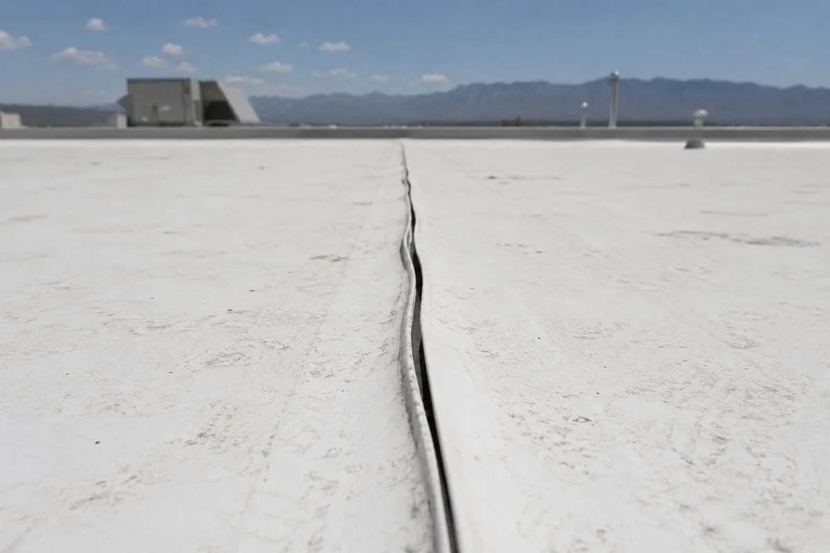 Same style TPO membrane roof with a separated, open seam