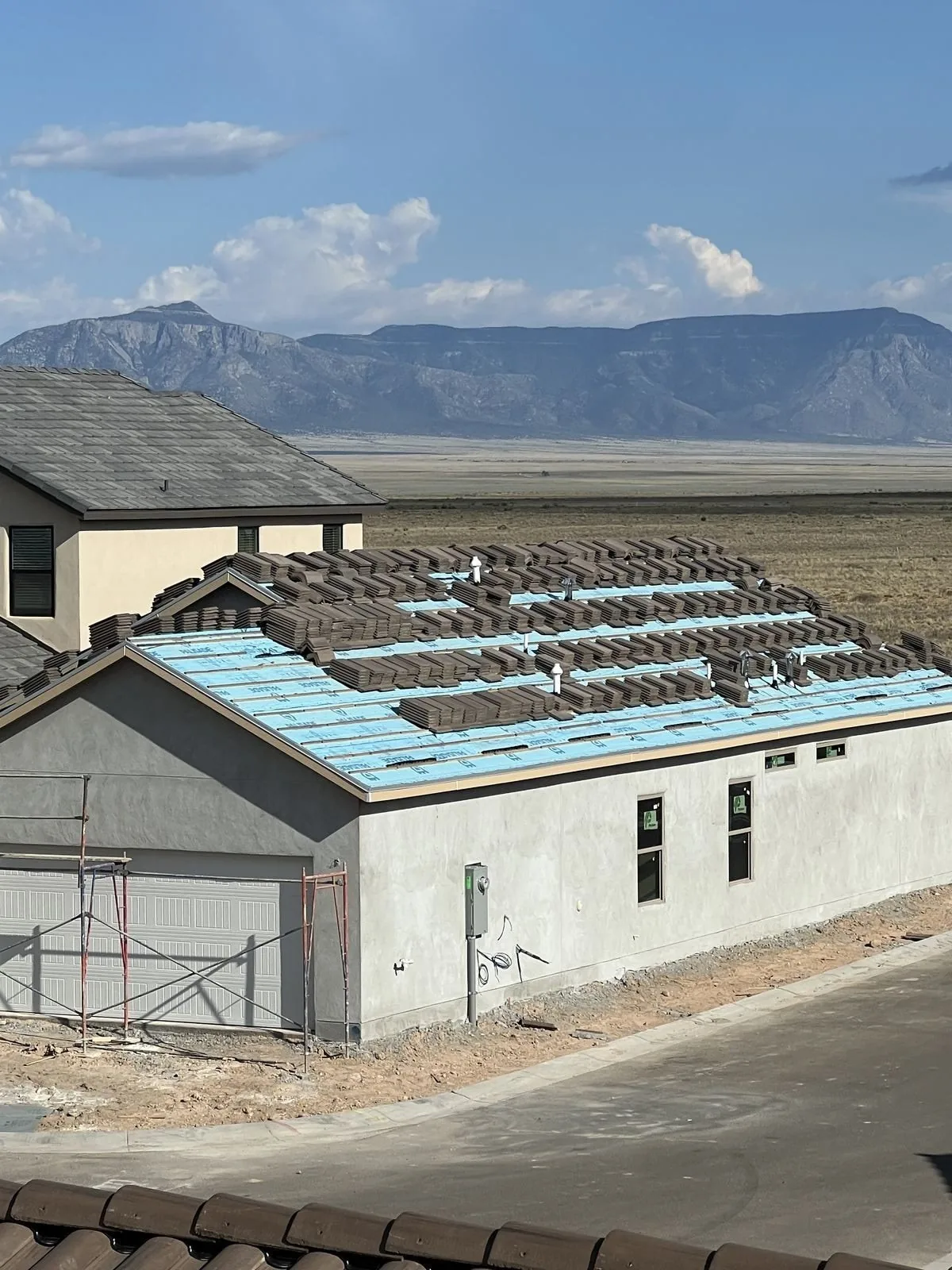 Tile roof with the Sandia Mountains in the background, Albuquerque, NM