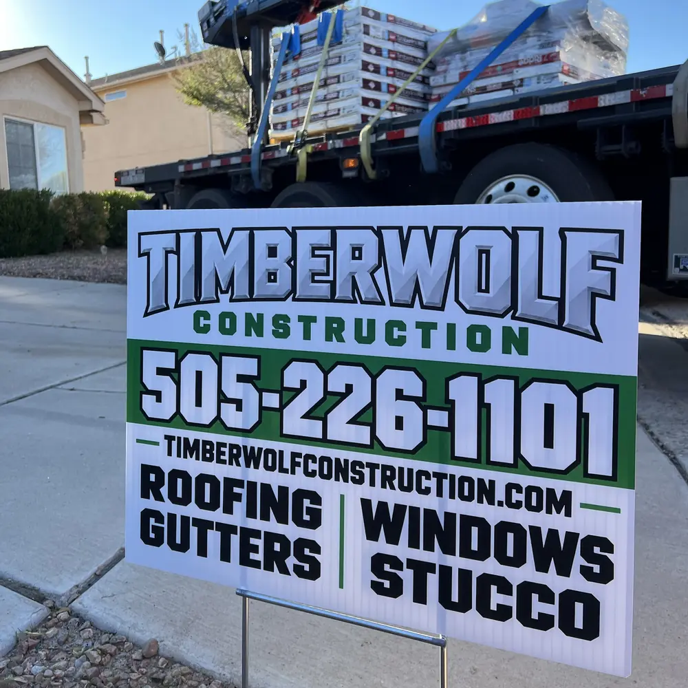 Timberwolf Construction yard sign in front of a home during a GAF shingle delivery