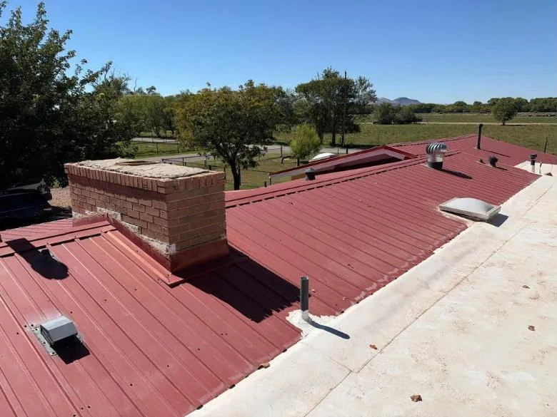 Metal and flat roof sections during a Timberwolf roof inspection